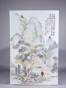 A LIGHT CRIMSON-COLORED PORCELAIN PLAQUE WITH LANDSCAPE