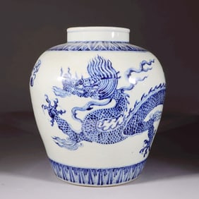 A BLUE-AND-WHITE JAR WITH DRAGON PATTERNS