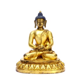 A GILT-BRONZE FIGURE OF BUDDHA