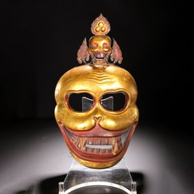 A GILT-BRONZE CITIPATI MASK