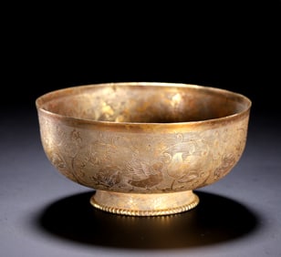 A GILT-SILVER FLORAL-AND-BIRD BOWL
