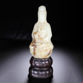 A JADE GUANYIN STATUE