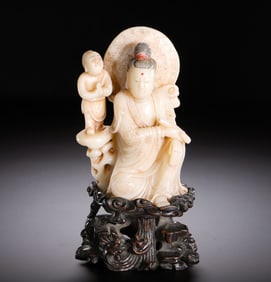 A SHOUSHAN STONE GUANYIN SEATED STATUE