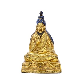 A GILT-BRONZE FIGURE OF BUDDHA