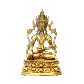 A GILT-BRONZE FIGURE OF BUDDHA