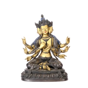 A BRONZE BUDDHA MOTHER WITH FOUR FACES AND EIGHT ARMS, GILDED WITH GOLD PASTE