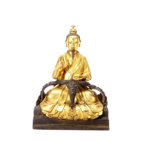 A GILT-BRONZE FIGURE OF LORD LINGBAO