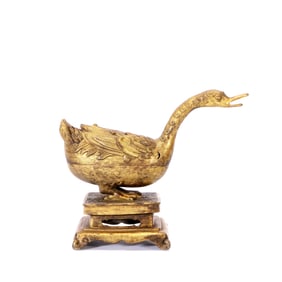 A GILT-BRONZE DUCK-SHAPED CENSER