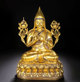 A GILT-BRONZE STATUE OF MASTER TSONGKHAPA