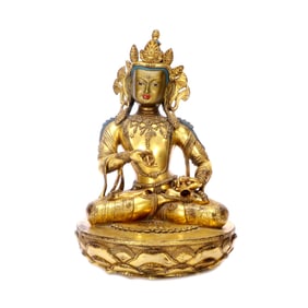 A GILT-BRONZE FIGURE OF BUDDHA