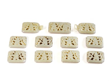 A SET OF HETIAN JADE BELT PLATES WITH FIGURE PATTERNS