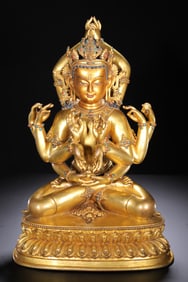 A GILT-BRONZE BUDDHA STATUE