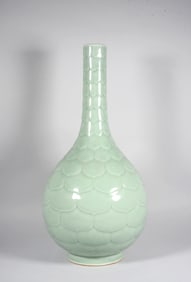 A CELADON LOTUS-SHAPED VASE