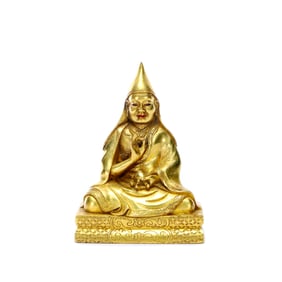 A GILT-BRONZE FIGURE OF TSONGKHAPA
