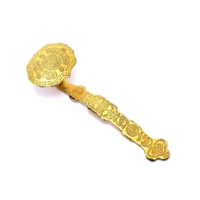 A GILT-BRONZE RUYI ORNAMENT