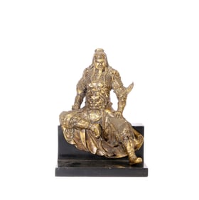 A GILT-BRONZE FIGURE OF GUAN GONG