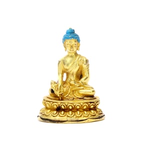 A GILT-BRONZE BUDDHA STATUE
