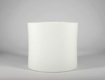 A WHITE-GLAZED INCISED FLORAL BRUSHPOT