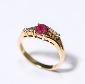 A Ruby K-Gold Ring