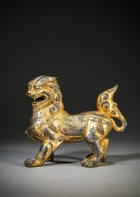 A Gilt-Bronze Lion