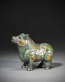 A Gold-and-Silver Inlaid Bronze Ox