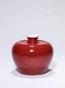 A Langyao Red-Glazed 'Apple' Zun