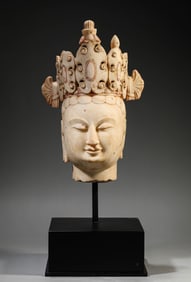 A White Marble Head of a Crowned Buddha