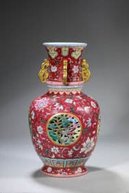 A Raspberry-Ground Famille Rose 'Flowers, Pine, and Crane' Revolving Vase