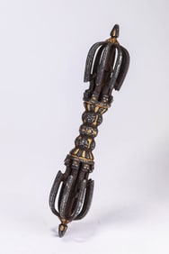 A Tibetan Iron 'Scissor-Cut Gold' Nine-Pronged Vajra
