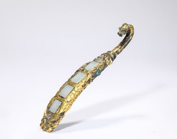 A Gilt-Bronze and Jade-Inlaid Belt Hook