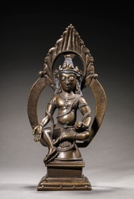 A Tibetan Pala-Style Silver-Inlaid Alloy Copper Figure of Yellow Jambhala