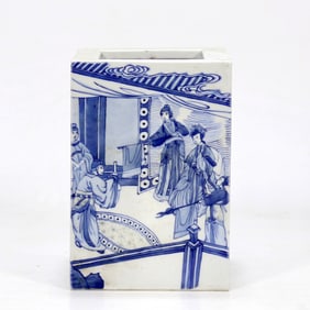 A BLUE AND WHITE UNDERGLAZE-RED SQUARE BRUSHPOT WITH 'SEEING OFF A COURT OFFICIAL' PATTERN