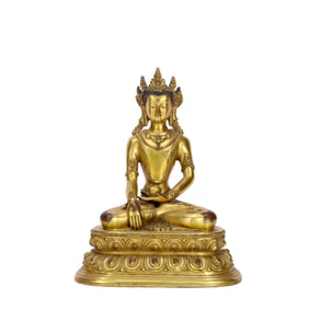 A GILT-BRONZE GUANYIN FIGURE