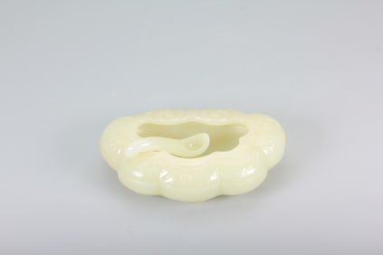 A JIAQING MARK A JADE RUYI-SHAPED LONG-LIFE WATERPOT