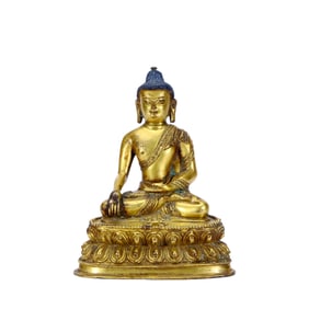 A GILT-BRONZE SHAKYAMUNI BUDDHA FIGURE