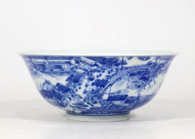 A BLUE AND WHITE BOWL WITH 'QINGMING RIVERSIDE' PATTERN