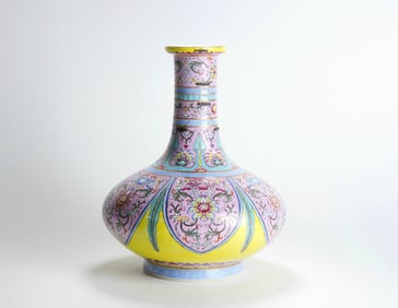 A QIANLONG FAMILLE ROSE LONGEVITY FLORAL VASE (RIVETED)