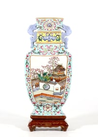A FAMILLE ROSE COURTYARD PAVILION WALL VASE