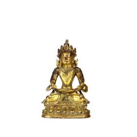 A GILT-BRONZE GUANYIN FIGURE