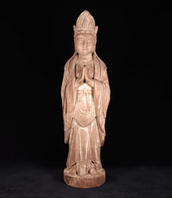 A WOOD CARVING GUANYIN ORNAMENT
