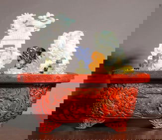 A CARVED RED LACQUER JADEITE FISH LEAPS DRAGON GATE PENJING