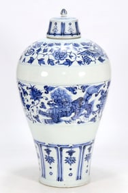 A BLUE AND WHITE COVERED MEIPING WITH DOUBLE LIONS PLAYING WITH BALL PATTERN