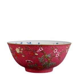 A ROSE-PINK GROUND SGRAFFITO FAMILLE ROSE INTERIOR BLUE-AND-WHITE BOWL