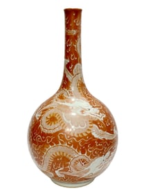 AN IRON-RED DRAGON BOTTLE VASE