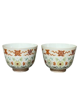A FAMILLE ROSE EIGHT IMMORTALS FLORAL CUP PAIR