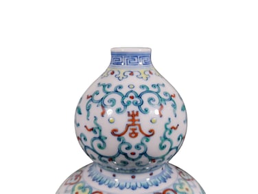 A BLUE-AND-WHITE DOUCAI LONGEVITY GOURD BOTTLE