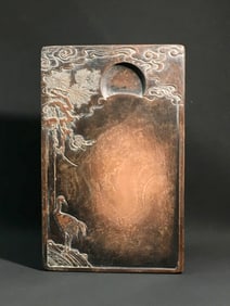 A RED-STREAKED INKSTONE PINE WIND CRANE SHADOW