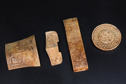 Group of Four Jade Carved Cloud Pattern Sword Ornament