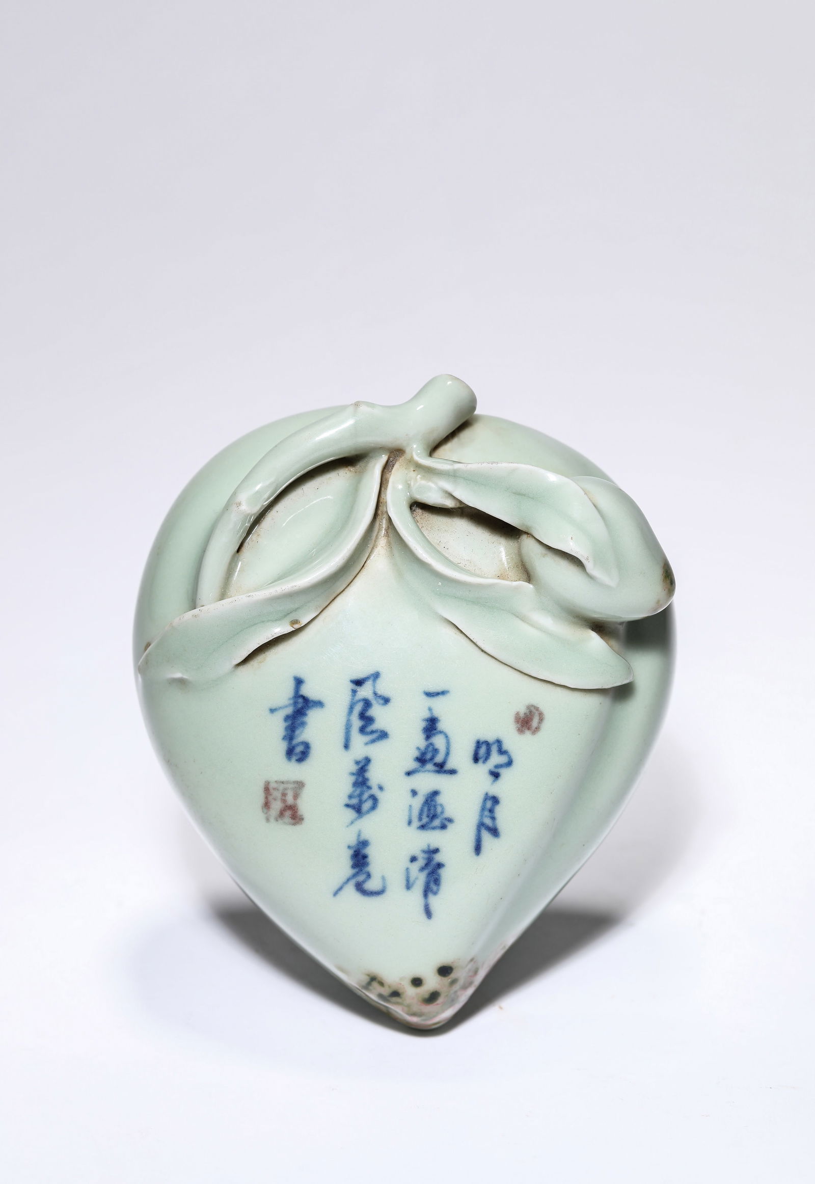 A Bean-Green-Glazed 'Poetic Inscription' Wall Vase: A Bean-Green-Glazed 'Poetic Inscription' Wall Vase (10.6 x 5.5 x 12.5cm)