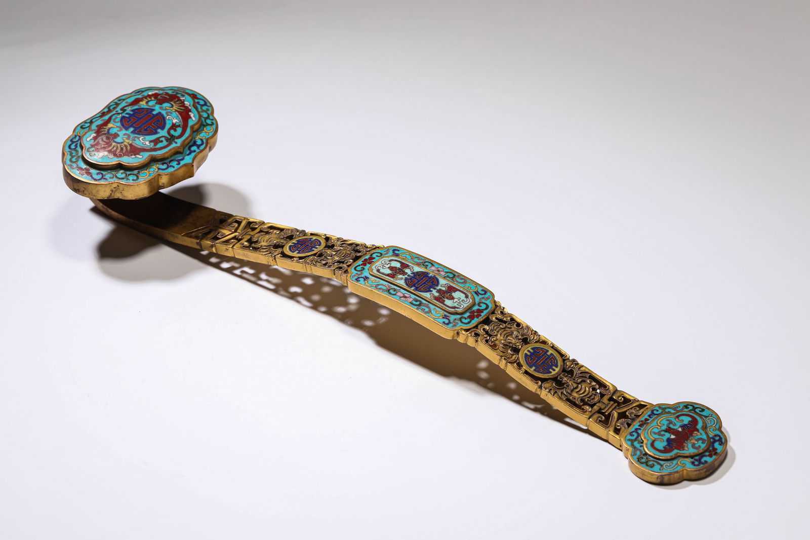 A Cloisonné Enamel ‘Bat and Shou’ Ruyi Sceptre: A Cloisonné Enamel ‘Bat and Shou’ Ruyi Sceptre (39 x 10 x 6.3cm,Weight 887g)